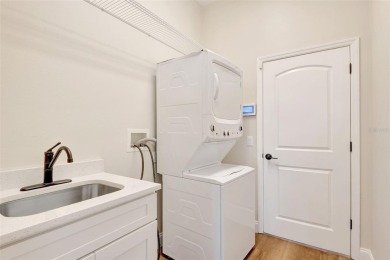 Welcome to this beautifully renovated 4-bedroom, 2.5-bathroom on The River Club in Florida - for sale on GolfHomes.com, golf home, golf lot