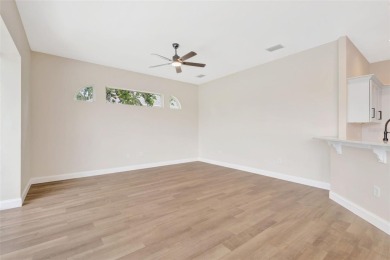 Welcome to this beautifully renovated 4-bedroom, 2.5-bathroom on The River Club in Florida - for sale on GolfHomes.com, golf home, golf lot