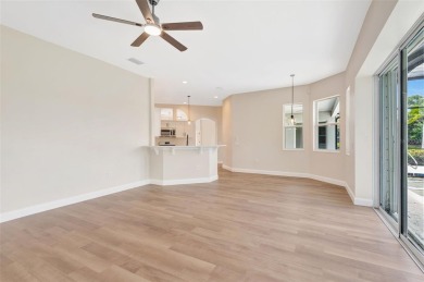 Welcome to this beautifully renovated 4-bedroom, 2.5-bathroom on The River Club in Florida - for sale on GolfHomes.com, golf home, golf lot