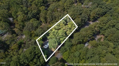 FIVE CAMP LOTS COMBINED INTO ONE BEAUTIFUL LAKE RETREAT!! One on River Golf and Country Club at Lake Royale in North Carolina - for sale on GolfHomes.com, golf home, golf lot