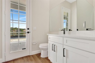 Welcome to this beautifully renovated 4-bedroom, 2.5-bathroom on The River Club in Florida - for sale on GolfHomes.com, golf home, golf lot