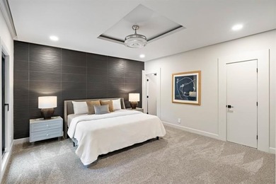 Set at the quiet end of an exclusive cul-de-sac, beyond a secure on Bobby Jones Golf Club in Georgia - for sale on GolfHomes.com, golf home, golf lot