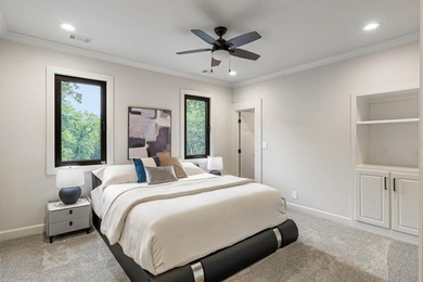 Set at the quiet end of an exclusive cul-de-sac, beyond a secure on Bobby Jones Golf Club in Georgia - for sale on GolfHomes.com, golf home, golf lot