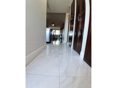 FULLY REMODELED LAKE FRONT-CONDO located in the heart of on Sunrise Lakes Phase IV Golf Course in Florida - for sale on GolfHomes.com, golf home, golf lot