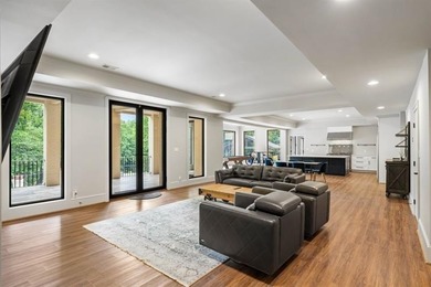 Set at the quiet end of an exclusive cul-de-sac, beyond a secure on Bobby Jones Golf Club in Georgia - for sale on GolfHomes.com, golf home, golf lot