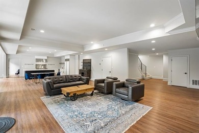 Set at the quiet end of an exclusive cul-de-sac, beyond a secure on Bobby Jones Golf Club in Georgia - for sale on GolfHomes.com, golf home, golf lot