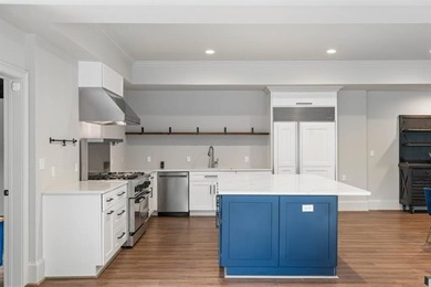 Set at the quiet end of an exclusive cul-de-sac, beyond a secure on Bobby Jones Golf Club in Georgia - for sale on GolfHomes.com, golf home, golf lot