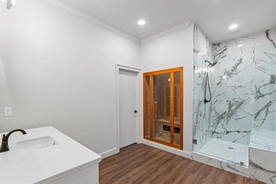 Set at the quiet end of an exclusive cul-de-sac, beyond a secure on Bobby Jones Golf Club in Georgia - for sale on GolfHomes.com, golf home, golf lot