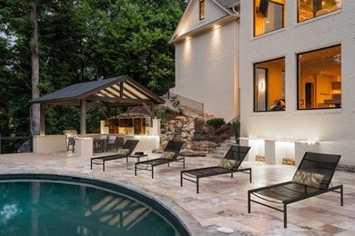 Set at the quiet end of an exclusive cul-de-sac, beyond a secure on Bobby Jones Golf Club in Georgia - for sale on GolfHomes.com, golf home, golf lot