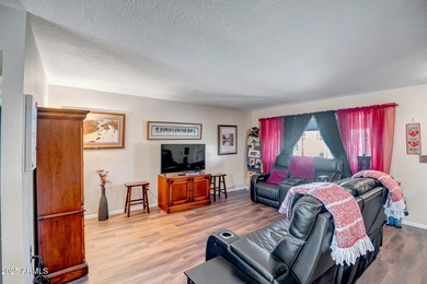 Discover the perfect blend of comfort and convenience at this on Sun City Lakes West and East in Arizona - for sale on GolfHomes.com, golf home, golf lot