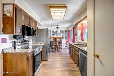 Discover the perfect blend of comfort and convenience at this on Sun City Lakes West and East in Arizona - for sale on GolfHomes.com, golf home, golf lot