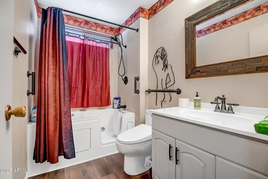 Discover the perfect blend of comfort and convenience at this on Sun City Lakes West and East in Arizona - for sale on GolfHomes.com, golf home, golf lot