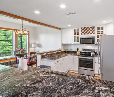 This is a must-see, upscale well-appointed condo in the gorgeous on Mountain Air Country Club in North Carolina - for sale on GolfHomes.com, golf home, golf lot