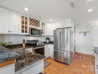 This is a must-see, upscale well-appointed condo in the gorgeous on Mountain Air Country Club in North Carolina - for sale on GolfHomes.com, golf home, golf lot