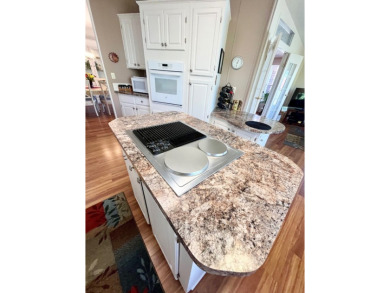 If you're looking for a beautifully maintained, move-in-ready on Pine Lakes Country Club in Florida - for sale on GolfHomes.com, golf home, golf lot