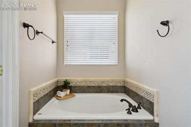 Stunning Ranch Home with Unbeatable Pikes Peak Views! Welcome to on Antler Creek Golf Course in Colorado - for sale on GolfHomes.com, golf home, golf lot