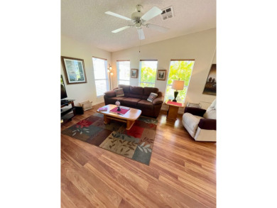 If you're looking for a beautifully maintained, move-in-ready on Pine Lakes Country Club in Florida - for sale on GolfHomes.com, golf home, golf lot