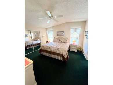 If you're looking for a beautifully maintained, move-in-ready on Pine Lakes Country Club in Florida - for sale on GolfHomes.com, golf home, golf lot