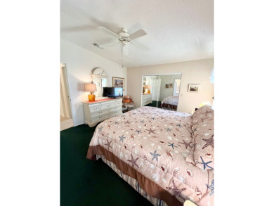 If you're looking for a beautifully maintained, move-in-ready on Pine Lakes Country Club in Florida - for sale on GolfHomes.com, golf home, golf lot