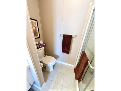 If you're looking for a beautifully maintained, move-in-ready on Pine Lakes Country Club in Florida - for sale on GolfHomes.com, golf home, golf lot