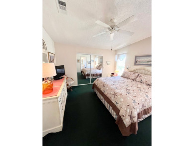If you're looking for a beautifully maintained, move-in-ready on Pine Lakes Country Club in Florida - for sale on GolfHomes.com, golf home, golf lot