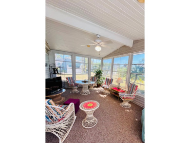 If you're looking for a beautifully maintained, move-in-ready on Pine Lakes Country Club in Florida - for sale on GolfHomes.com, golf home, golf lot