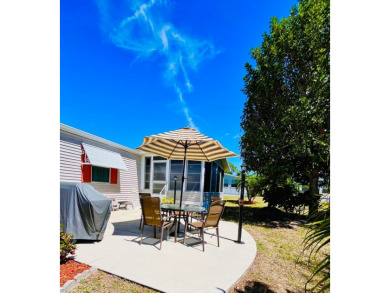 If you're looking for a beautifully maintained, move-in-ready on Pine Lakes Country Club in Florida - for sale on GolfHomes.com, golf home, golf lot