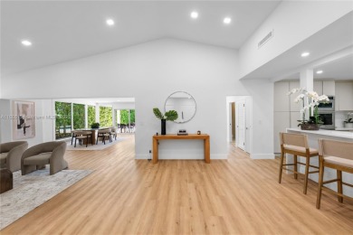 Exceptional fully renovated waterfront residence located on the on Normandy Shores Golf Course in Florida - for sale on GolfHomes.com, golf home, golf lot