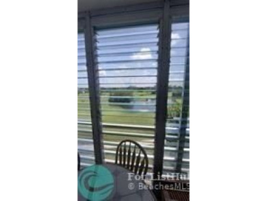 ELEGANT 3 BEDROOM 2 BATH; CONDO IN THE PALM AIRE COUNTRY CLUB on Palm-Aire Country Club and Resort - Palms in Florida - for sale on GolfHomes.com, golf home, golf lot