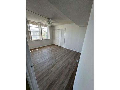 ELEGANT 3 BEDROOM 2 BATH; CONDO IN THE PALM AIRE COUNTRY CLUB on Palm-Aire Country Club and Resort - Palms in Florida - for sale on GolfHomes.com, golf home, golf lot