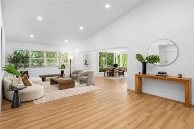 Exceptional fully renovated waterfront residence located on the on Normandy Shores Golf Course in Florida - for sale on GolfHomes.com, golf home, golf lot