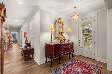 This charming Southern residence is gracefully set behind a on Canebrake Country Club in Mississippi - for sale on GolfHomes.com, golf home, golf lot