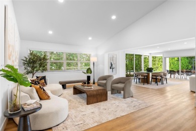 Exceptional fully renovated waterfront residence located on the on Normandy Shores Golf Course in Florida - for sale on GolfHomes.com, golf home, golf lot