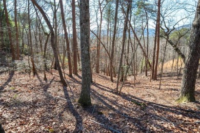 Welcome to 141 Indian Oak Drive!  This is the perfect canvas for on The Highlands Course at Lake Arrowhead in Georgia - for sale on GolfHomes.com, golf home, golf lot