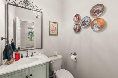 This charming Southern residence is gracefully set behind a on Canebrake Country Club in Mississippi - for sale on GolfHomes.com, golf home, golf lot