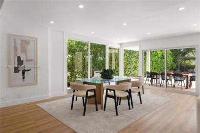 Exceptional fully renovated waterfront residence located on the on Normandy Shores Golf Course in Florida - for sale on GolfHomes.com, golf home, golf lot