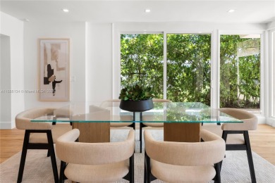 Exceptional fully renovated waterfront residence located on the on Normandy Shores Golf Course in Florida - for sale on GolfHomes.com, golf home, golf lot