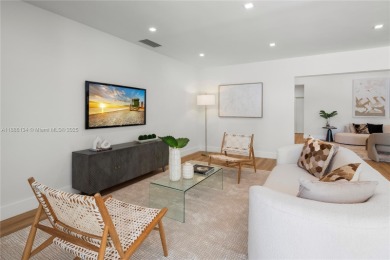 Exceptional fully renovated waterfront residence located on the on Normandy Shores Golf Course in Florida - for sale on GolfHomes.com, golf home, golf lot
