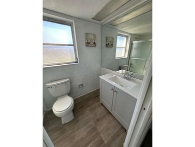 ELEGANT 3 BEDROOM 2 BATH; CONDO IN THE PALM AIRE COUNTRY CLUB on Palm-Aire Country Club and Resort - Palms in Florida - for sale on GolfHomes.com, golf home, golf lot