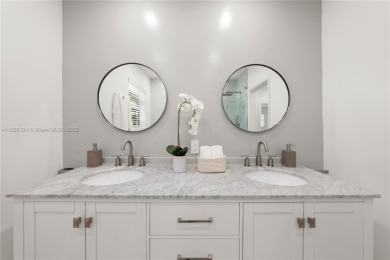 Exceptional fully renovated waterfront residence located on the on Normandy Shores Golf Course in Florida - for sale on GolfHomes.com, golf home, golf lot
