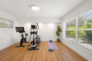 Exceptional fully renovated waterfront residence located on the on Normandy Shores Golf Course in Florida - for sale on GolfHomes.com, golf home, golf lot