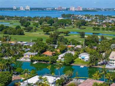 Exceptional fully renovated waterfront residence located on the on Normandy Shores Golf Course in Florida - for sale on GolfHomes.com, golf home, golf lot