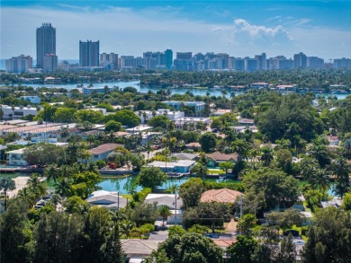Exceptional fully renovated waterfront residence located on the on Normandy Shores Golf Course in Florida - for sale on GolfHomes.com, golf home, golf lot