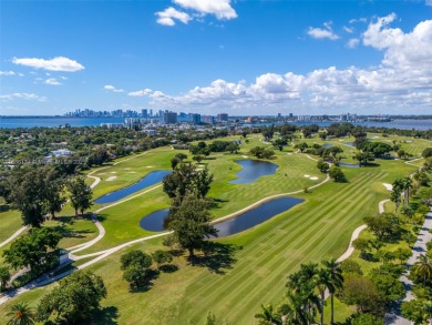 Exceptional fully renovated waterfront residence located on the on Normandy Shores Golf Course in Florida - for sale on GolfHomes.com, golf home, golf lot