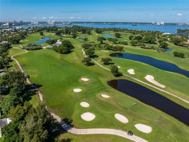 Exceptional fully renovated waterfront residence located on the on Normandy Shores Golf Course in Florida - for sale on GolfHomes.com, golf home, golf lot