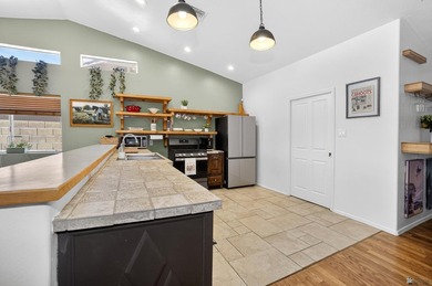 Welcome to this beautifully updated 3-bedroom, 2-bath home in on Mesa Del Sol Golf Club in Arizona - for sale on GolfHomes.com, golf home, golf lot