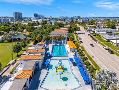 Exceptional fully renovated waterfront residence located on the on Normandy Shores Golf Course in Florida - for sale on GolfHomes.com, golf home, golf lot