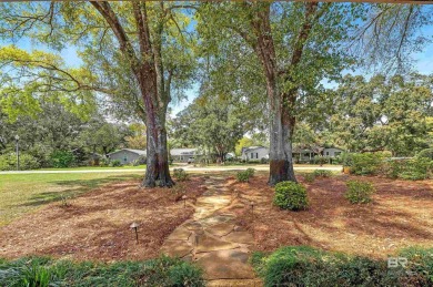 This well-maintained 1661 square foot, three-bedroom, two- bath on The Golf Club of the Wharf in Alabama - for sale on GolfHomes.com, golf home, golf lot