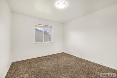 Beautifully maintained twinhome in the Woodland Hill subdivision on Sand Creek Golf Course in Idaho - for sale on GolfHomes.com, golf home, golf lot