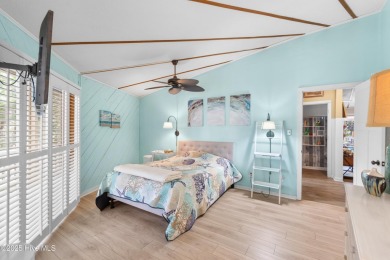 Nestled in the picturesque Pine Knoll Shores of North Carolina on The Country Club of the Crystal Coast in North Carolina - for sale on GolfHomes.com, golf home, golf lot